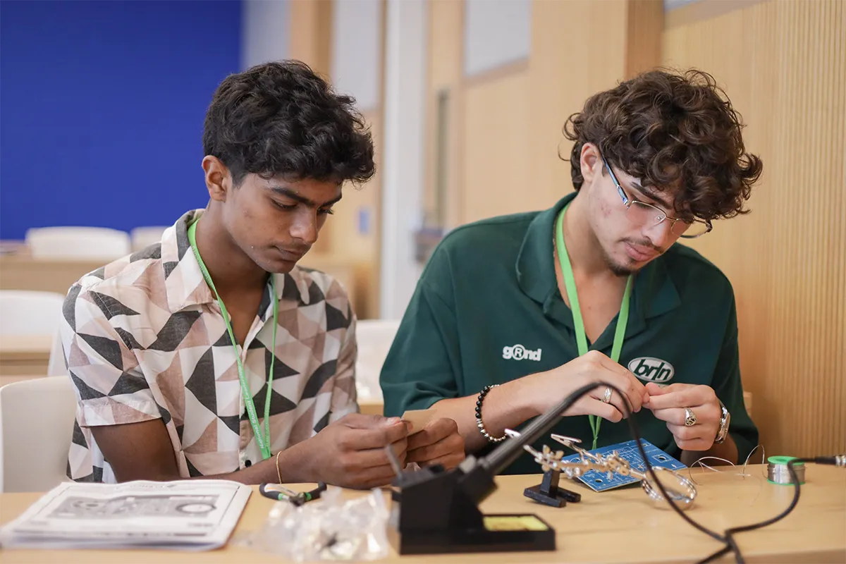 IEEE TryEngineering Summer Institute summer camp participants with their various projects