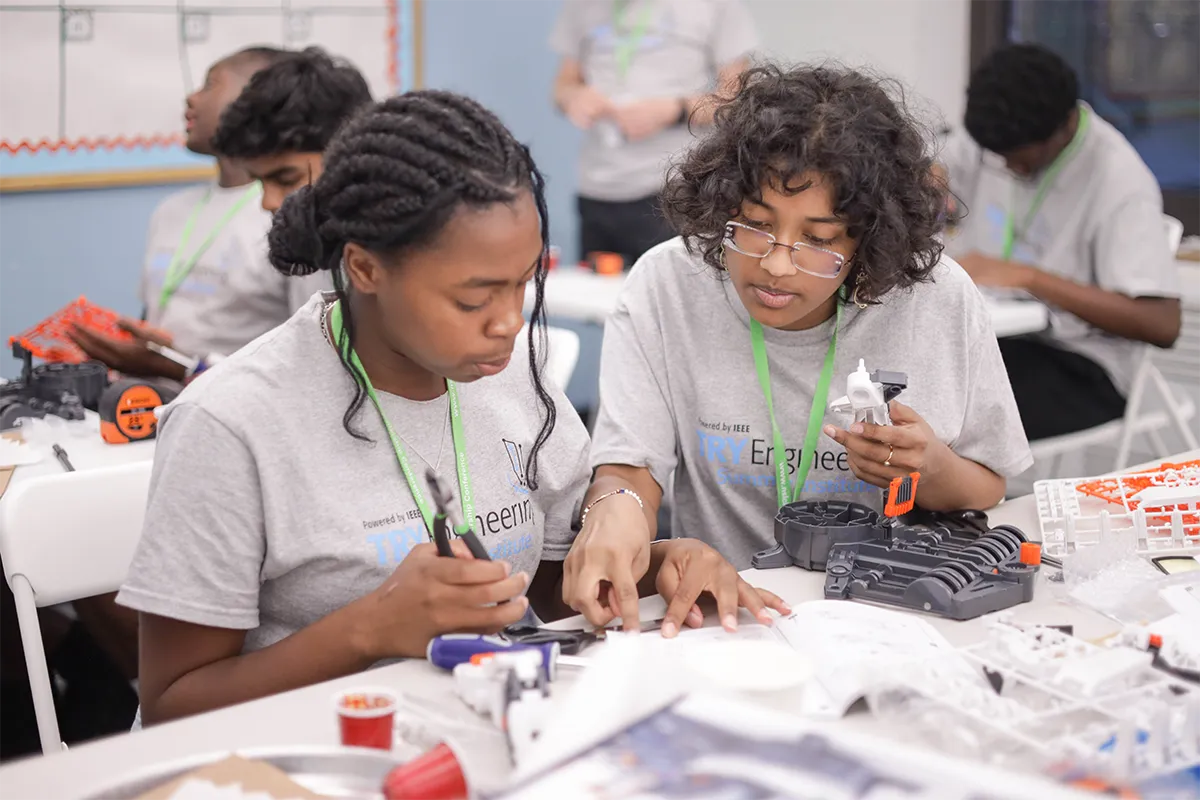 IEEE TryEngineering Summer Institute summer camp participants with their various projects