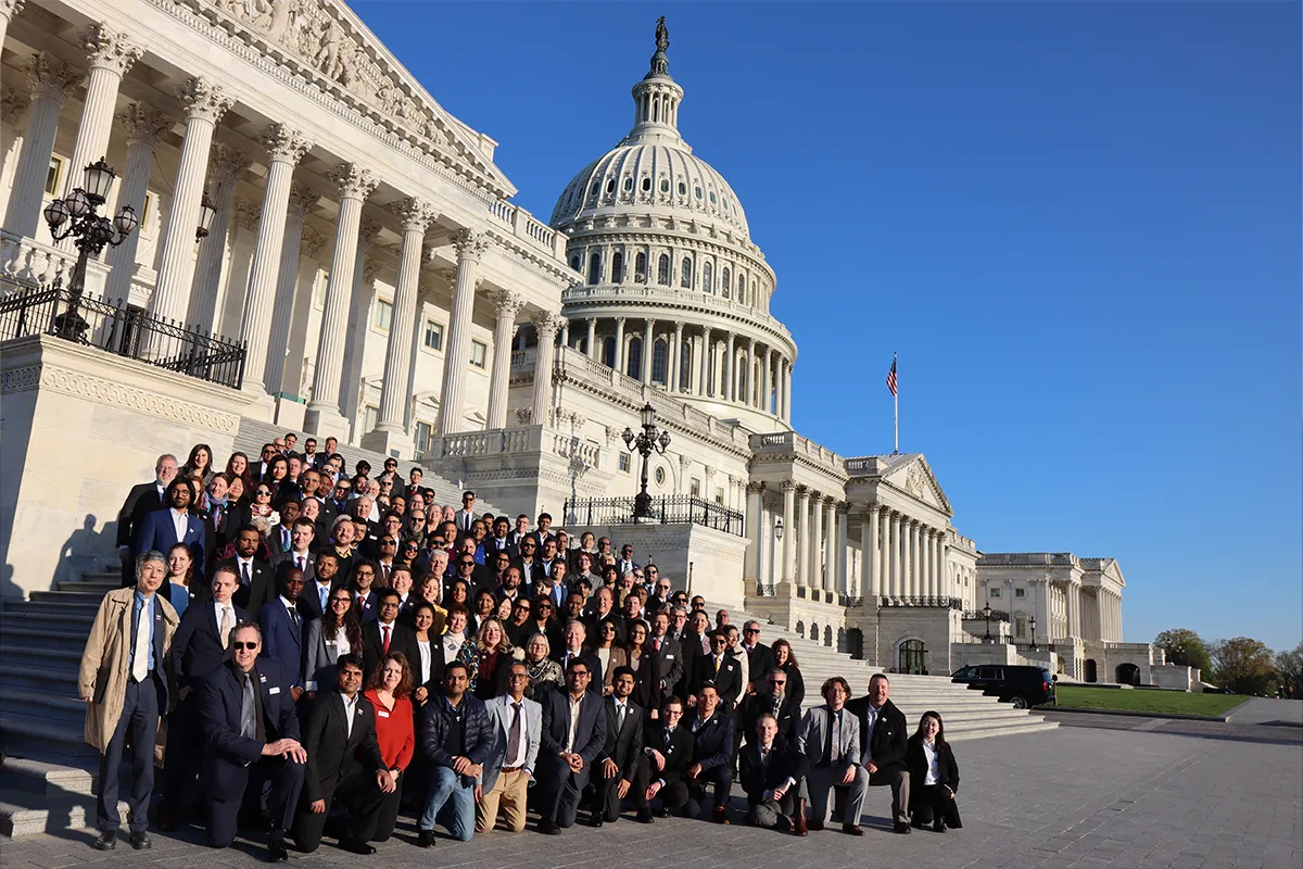 During IEEE-USA’s Congressional Visit Day, attendees take time to pose on the steps of the U.S. Capitol
